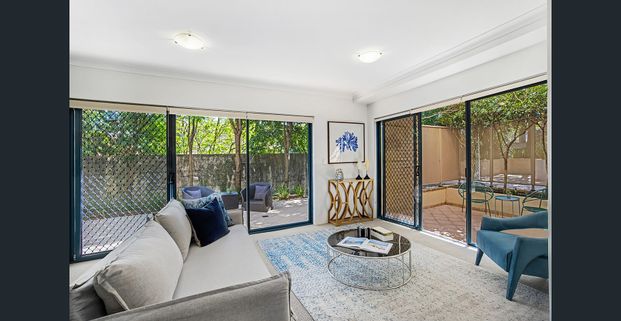 Unique, Spacious Garden Apartment In An Ideal Location With a Garage - Photo 1