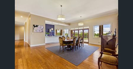 Impressive 4-Bedroom Home with In-Law Accommodation & Huge Storage - Photo 4