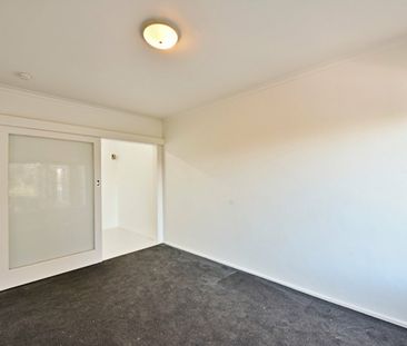 Register to Inspect // Spacious 1-Bedroom Apartment in the Heart of... - Photo 3