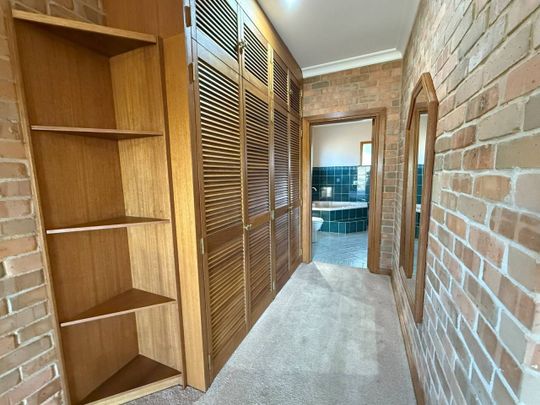 Spacious Family Home with Breathtaking Bushland Views and Flexible Living - Photo 1