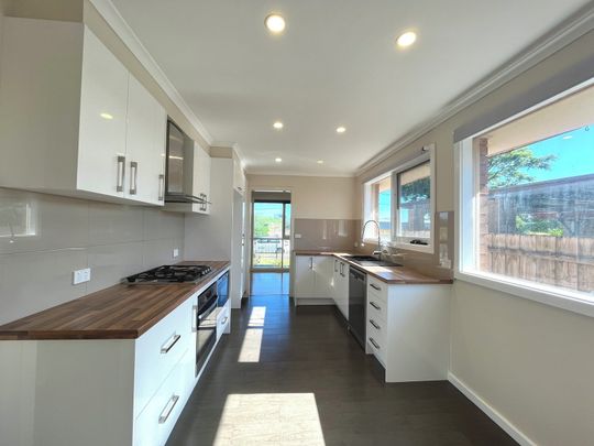 LOVELY THREE BEDROOM HOME - Photo 1