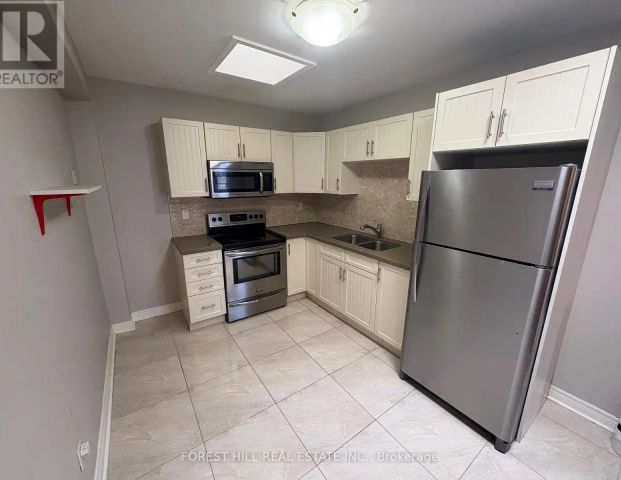 2 - 341 LAKESHORE ROAD E — 2 Bedroom - Photo 1