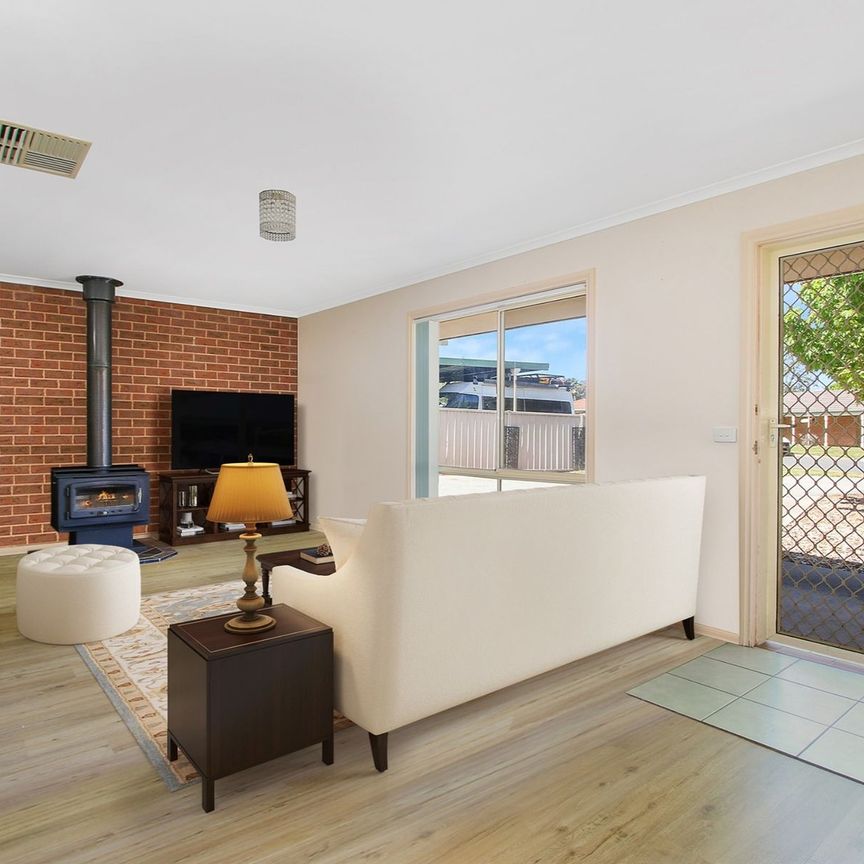 COMFORTABLE FAMILY HOME - Photo 1