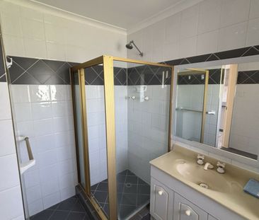 Two Bedroom Top Floor Unit - Photo 5