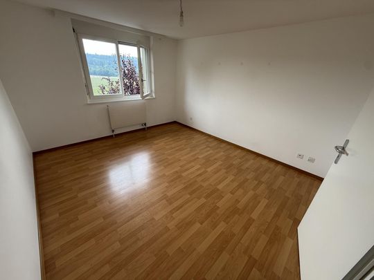Spacious 2.5 room apartment with unobstructed view in Fétigny - Photo 1