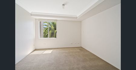 Blissfully tranquil apartment in sort after security building - Photo 2