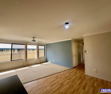 Neat & Low-Maintenance 3 Bedroom Home - Photo 2
