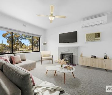 Freshly Renovated, Low-Maintenance Living - Photo 1