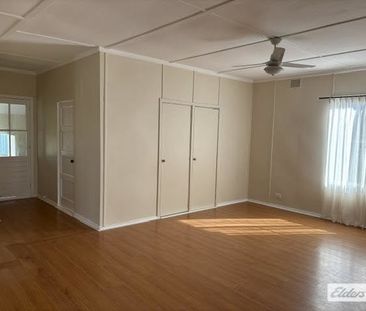 Long-Term 2-Bedroom Rental with Secure Fenced Yard - Photo 2