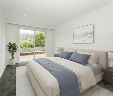 RENOVATED TWO BEDROOM UNIT WITH EXPANSE OF OUTDOOR SPACE - Photo 4