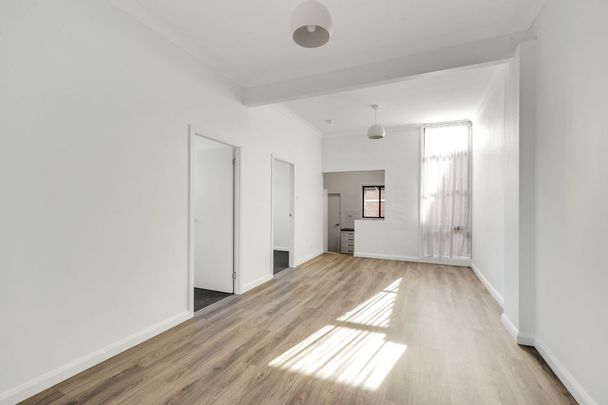 Renovated Three-Bedroom Unit in Commercial Precinct - Photo 1