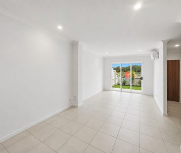 MODERN, SPACIOUS & LOW MAINTENANCE LIVING IN THE HEART OF AURA! - Photo 1