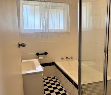 Spacious Family Home with Self-Contained Lower Level - Photo 4