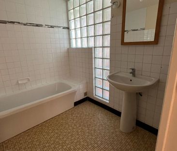 Appartement T4 de 98 m² -Saint Yvi - Photo 6