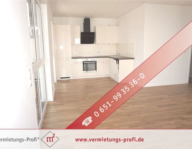 Barrierefreie Traumwohnung mit Moselblick im Erdgeschoss – Lichtdurchflutete, moderne 2 ZKB Wohnung mit großer Terrasse & Tiefgaragenstellplatz in bester Lage! - Photo 1