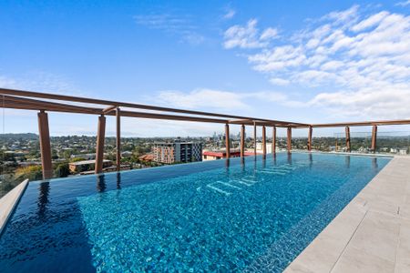 TWO BED + SMALL 3RD BEDROOM/MEDIA ROOM - Stunning Mt Cootha views at Indooroopilly’s Most Desirable New Lifestyle Address - Photo 3