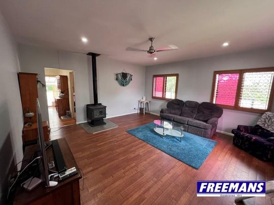 Fabulous Family Home with 9×7.5m shed extra high for mobile home & boat - Photo 1