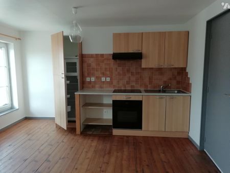 Un appartement au 1er étage dans le centre du bourg - Photo 3