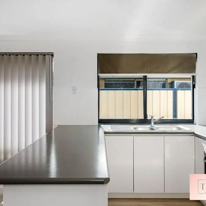 “Low-Maintenance Living” - Photo 1