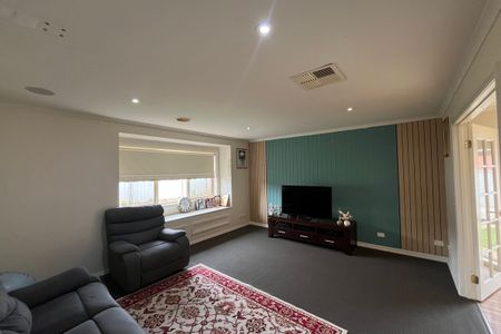 Modern 4-Bedroom Home with Multiple Living Areas - Photo 2