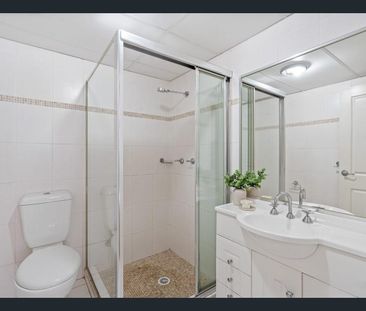 Sun-Drenched, Spacious & Convenient Living - Photo 6