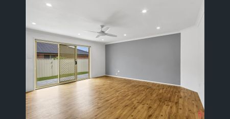 Large, modern 4-bedroom family home on corner block - Photo 5