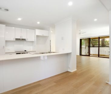 RENOVATED DUPLEX WITH POOL AND TENNIS COURT IN COMPLEX - Photo 4