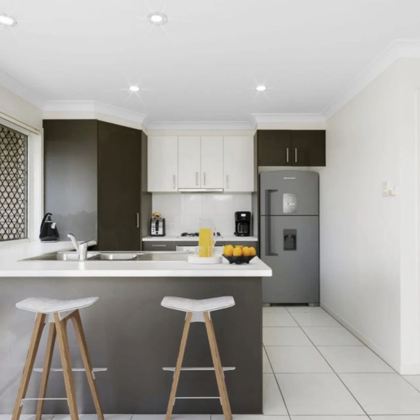 Modern Townhouse Living in the Heart of Springfield Lakes - Photo 1