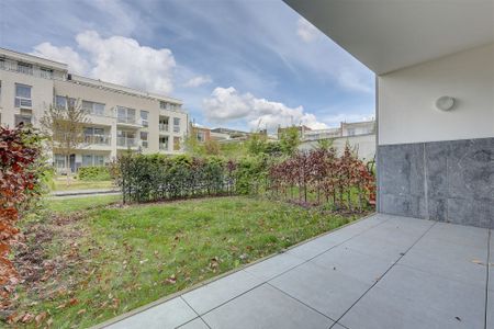 Lichtrijk appartement met 2 slaapkamers, staanplaats en gezellige tuin! - Photo 2