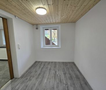 Appartement de 2,5 pièces au rez-de-chaussée - Foto 1