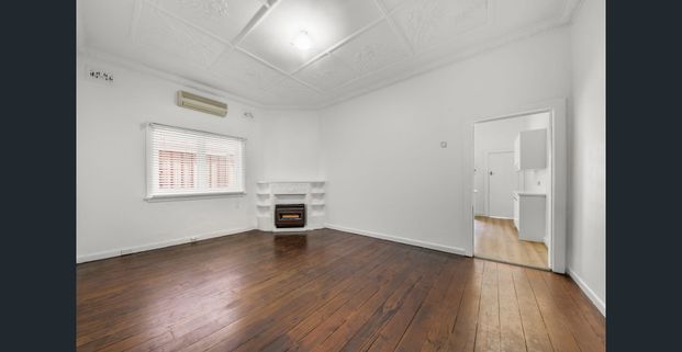 Charming Coastal Semi with Spacious Indoor & Outdoor Living - Photo 1