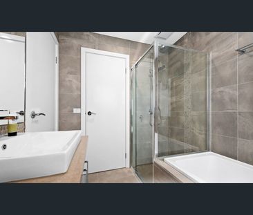 Luxurious 4-Bedroom Beauty in Prime Location - Photo 1