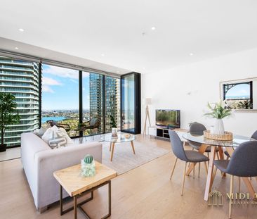 Stunning Two-Bedroom Penthouse with Breathtaking Water Views - Photo 6