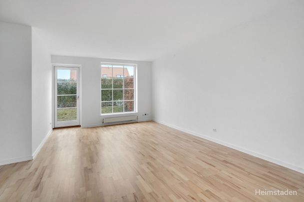 Rækkehus med skøn gårdhave et stenkast fra vandet - Foto 1