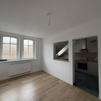 Zentral gelegene Dachgeschosswohnung mit Einbauküche in Zwickau - Photo 1