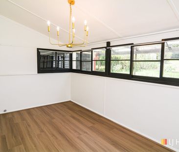 TASTEFULLY RESTORED HIGH SET HOME - Photo 3