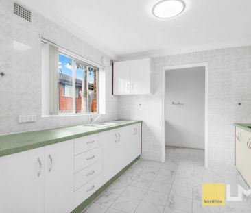 WELL-MAINTAINED BLOCK & APARTMENT - Photo 1