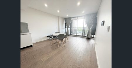 Elegantly Furnished 2-Bedroom Apartment with Parking - Photo 5