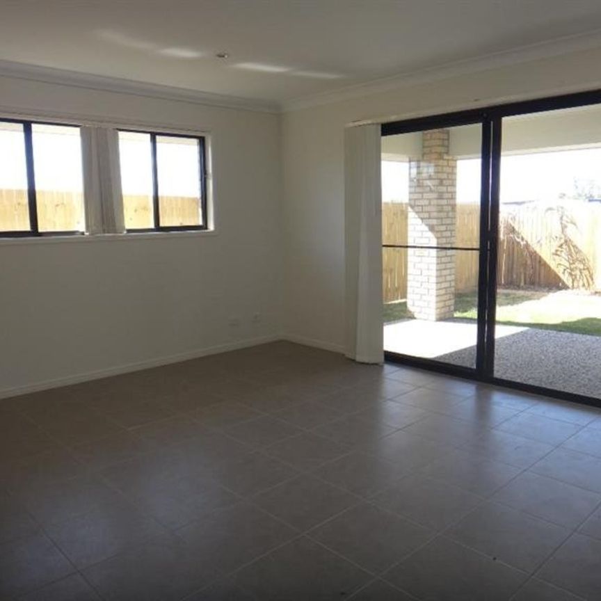 Great Family Home in Sought-After Coomera Grand Estate - Photo 1