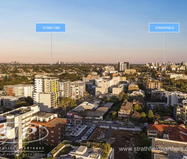 Stunning Top-Floor Apartment with Sweeping District Views - ACCESS ... - Photo 4
