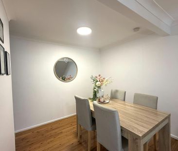 SPACIOUS FOUR BEDROOM TOWNHOUSE - Photo 1