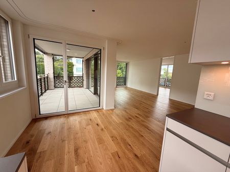 Wunderschöne 3.5-Zimmer-Gartenwohnung in Rümlang – stilvoller Neubau mit hohem Wohnkomfort - Foto 2