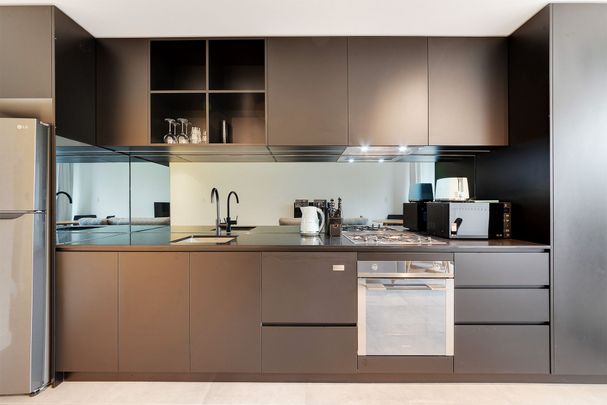 Furnished Apartment With Storage Cage - Photo 1