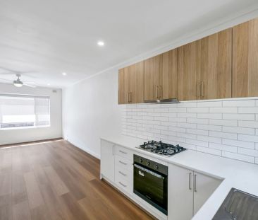 Stylish city to sea living - Photo 6