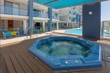 FULLY FURNISHED Live in 5 star resort luxury overlooking the trees and with city views - Photo 3