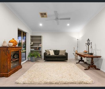 Renovated Family Home with Elevated Privacy and Lush Garden Living - Photo 1