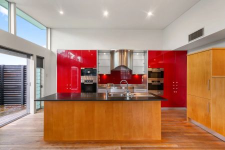Sophisticated Upper-Level Apartment with Double Garage, North-Facing Balcony & Private Sauna - Photo 2