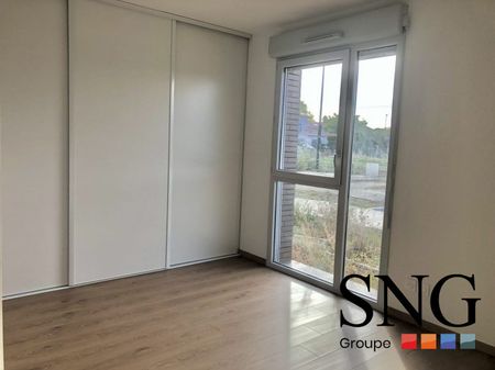 T2 AVEC TERRASSE / JARDIN ET PARKING - Photo 2