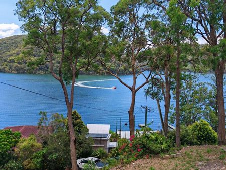 Private and Peaceful Granny Flat with Breathtaking Water Views - Photo 2