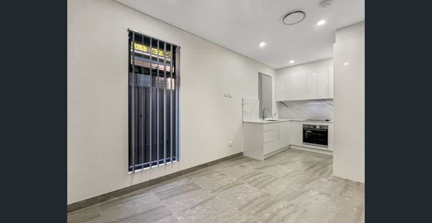 NEAR NEW GRANNY FLAT - WATER INCLUDED! - Photo 1